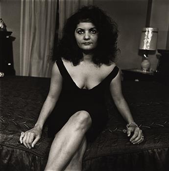 DIANE ARBUS (1923-1971) A Puerto Rican Housewife, N.Y.C.                                                                                         